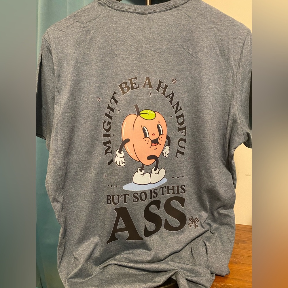 “I MIGHT BE A HANDFUL BUT SO IS THIS ASS” tee